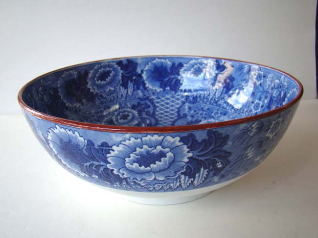A magnificent early 19th century English blue and white transfer decorated bowl with red rim circa 1820